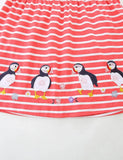 Gestreepte jurk met pinguïnapplicatie