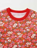 Robe de Noël à fleurs avec appliqué Père Noël